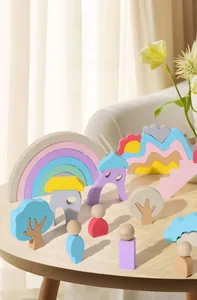 Detailed view of macaron colored wooden rainbow blocks and geometric building components