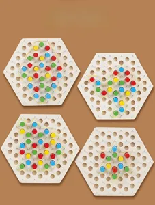 Macro detail of hexagonal wooden puzzle with colorful pegs and elastic bands for shapes