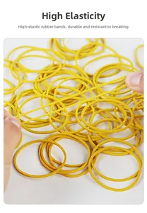 Macro shot of high elasticity yellow rubber bands being stretched to show durability