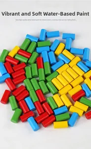 Close-up of assorted colorful wooden cylinders for tabletop chain chess game and puzzles