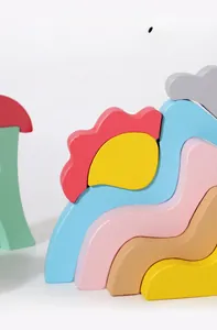 Detail of colorful wooden rainbow stacking blocks showing smooth texture and rounded edges