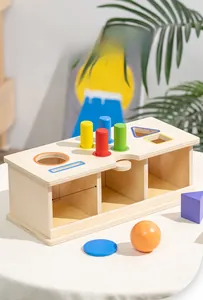 Detail of wooden geometric toy showing 8.2cm wide storage slot for shape sorting blocks