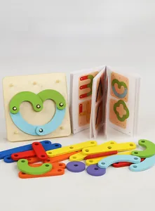 Macro shot of wooden Montessori pegboard with colorful geometric shapes and manual