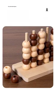 Detailed view of polished wooden spheres and pillars for a classic four piece board game
