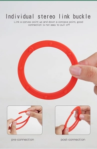Detail showing the snap-fit connection mechanism of red plastic building block pieces
