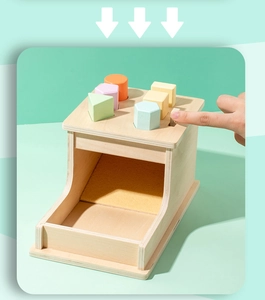 Detail view of colorful wooden geometric blocks and interactive sorting lever mechanism