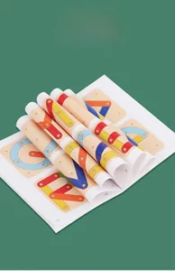 Detailed pattern manual for Montessori wooden geoboard puzzle showing various creative designs