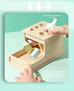 Detail of Montessori wooden shape sorting toy featuring gravity slide mechanism for toddlers