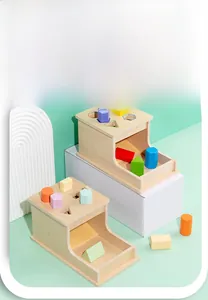 Detailed top view of wooden geometric shape sorter toy in basic and macaron colors