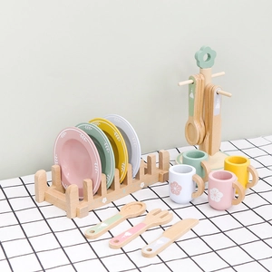 Kids wooden play kitchen set with macaron-colored plates, cups, and drying rack