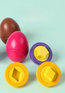 Detailed view of plastic matching eggs showing geometric star and diamond shapes