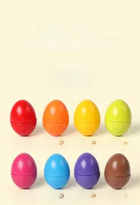 Set of eight colorful wooden eggs for matching shapes and early educational learning