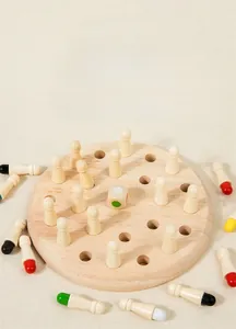 Macro shot of colorful wooden memory chess pieces and round board for kids focus training