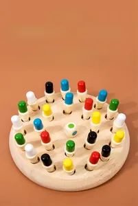 Detail of wooden memory chess game with 24 colorful peg pieces and round game board