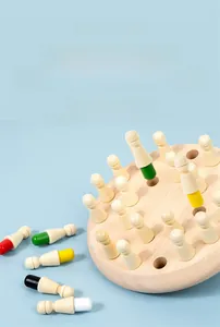 Close-up of wooden memory chess pieces with colorful bottom tips on circular base