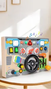 Detail of wooden busy board with steering wheel, ignition key, and gear shifter for kids