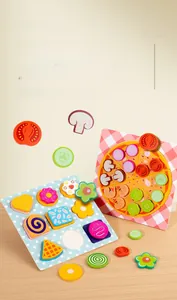 Close-up of wooden pizza and dessert shapes on matching boards for early learning play