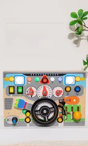 Close-up of wooden cockpit toy with gear shifter, ignition key, and colorful LED buttons