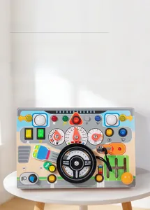 Macro view of wooden steering wheel busy board with key ignition and simulated gear shift