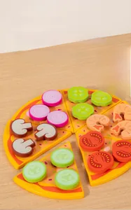 Detail of wooden play pizza set with realistic vegetable toppings and shrimp pieces