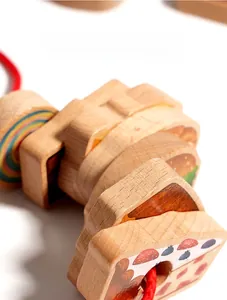Close-up of wooden beads made of beech wood showing high-quality texture and colorful details