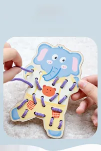 Close-up of elephant wooden lacing board for developing fine motor skills in toddlers