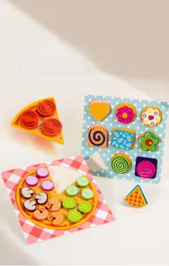 Detailed view of layered wooden pizza toy with colorful vegetable toppings and cookies