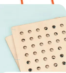 Detail of smooth wooden puzzle board with rounded edges and multi-hole design for kids