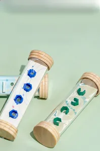 Detail of wooden balance tube maze with internal steps for children eye-hand coordination