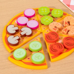 Wooden toy pizza set with assorted toppings on a rustic natural wood table background