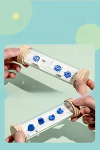 Dual-sided handheld wooden ball maze toy showing front and back puzzle structures
