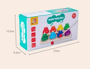 Detailed packaging showing dimensions 23x12.5x6.3cm for the eight-tone hand bell music set