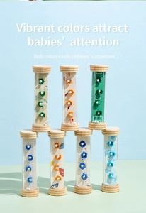 Detailed view of 7-piece wooden rainmaker rattle set with colorful beads and patterns