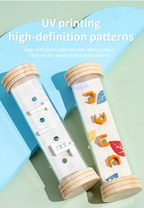 Close-up of wooden balance toy showing high-definition UV printing with vivid leaf patterns