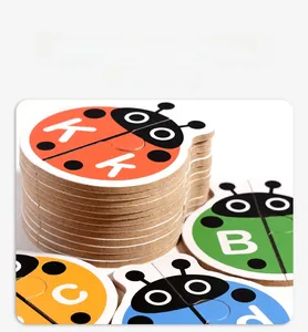 Detail of colorful wooden ladybug puzzle pieces showing alphabet letters and thick wood texture