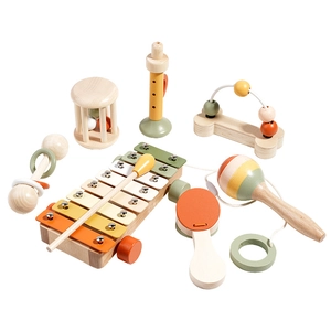 7-piece wooden baby musical instrument set including xylophone and rattles in forest tones