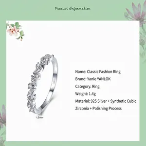 Classic S925 sterling silver ring with marquise zirconia stones on a white background