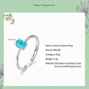 Bague élégante en argent 925 avec tourmaline paraiba synthétique ovale bleue
