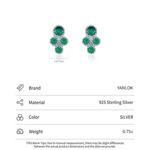 Boucles d'oreilles mini émeraude en argent 925 avec design élégant de fleurs en croix