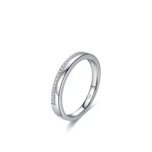 Minimalist S925 sterling silver ring with delicate pave-set diamonds in a 45-degree view