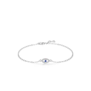 Detail of S925 sterling silver evil eye bracelet with blue gemstone and white pavé stones