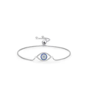 Detailed shot of silver Evil Eye bracelet with blue and clear zircon and slider clasp