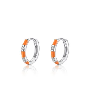 S925 sterling silver hoop earrings with orange enamel and zircon inlay on white background