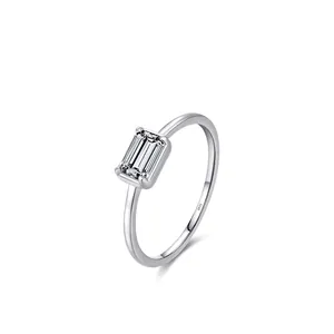Elegant S925 sterling silver ring with emerald cut cubic zirconia on white background