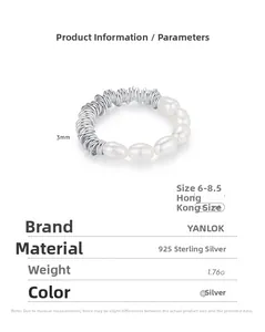 Close-up of S925 sterling silver elastic ring with natural freshwater pearls and metal coils