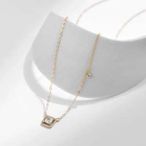 Minimalist gold S925 sterling silver necklace featuring a sparkling square zircon pendant