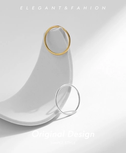 Minimalist S925 sterling silver stacking rings in polished gold and silver finishes