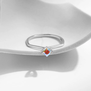 Elegant S925 sterling silver ring with square rainbow cubic zirconia on a white tray