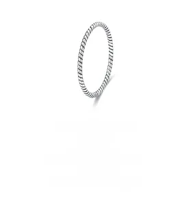 Macro shot of minimalist S925 sterling silver twisted rope ring texture and fine finish