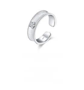 Detailed macro view of S925 sterling silver matte ring with engraved floral diamond patterns